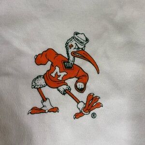 MIAMI HURRICANES sleeveless, tie-up the front shirt.  Size Xl. Brand new w/tags